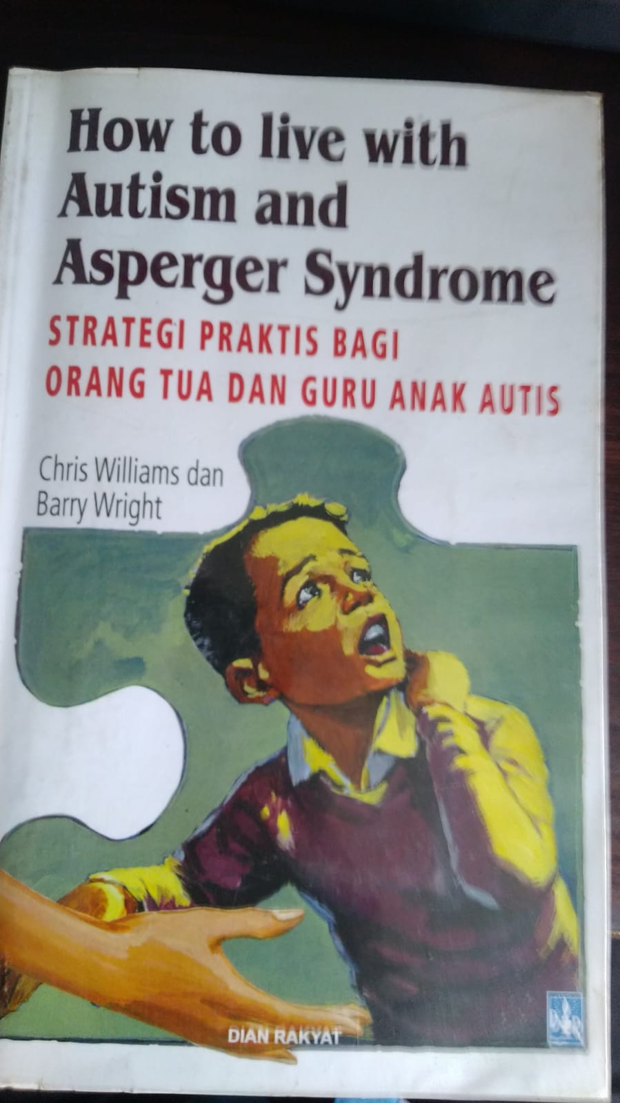 How to Live with Austism and Asperger Syndrome : Strategi praktis bagi orang tua dan guru anak autis