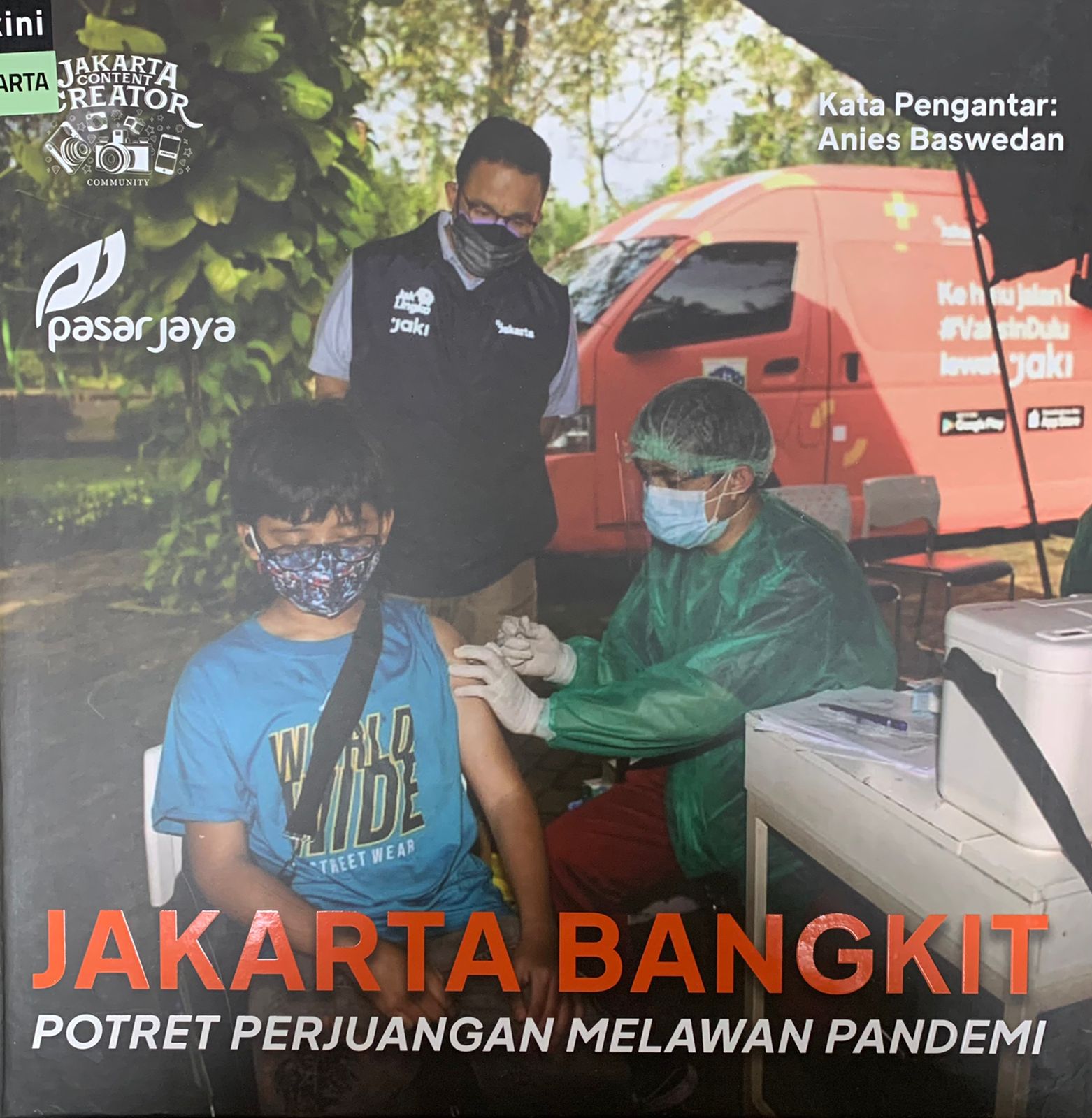 Jakarta bangkit : potret perjuangan melawan pandemi