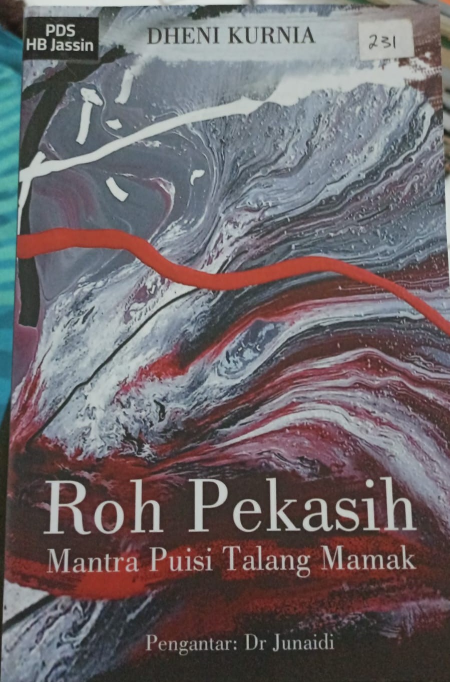 Roh pekasih : mantra puisi talang mamak