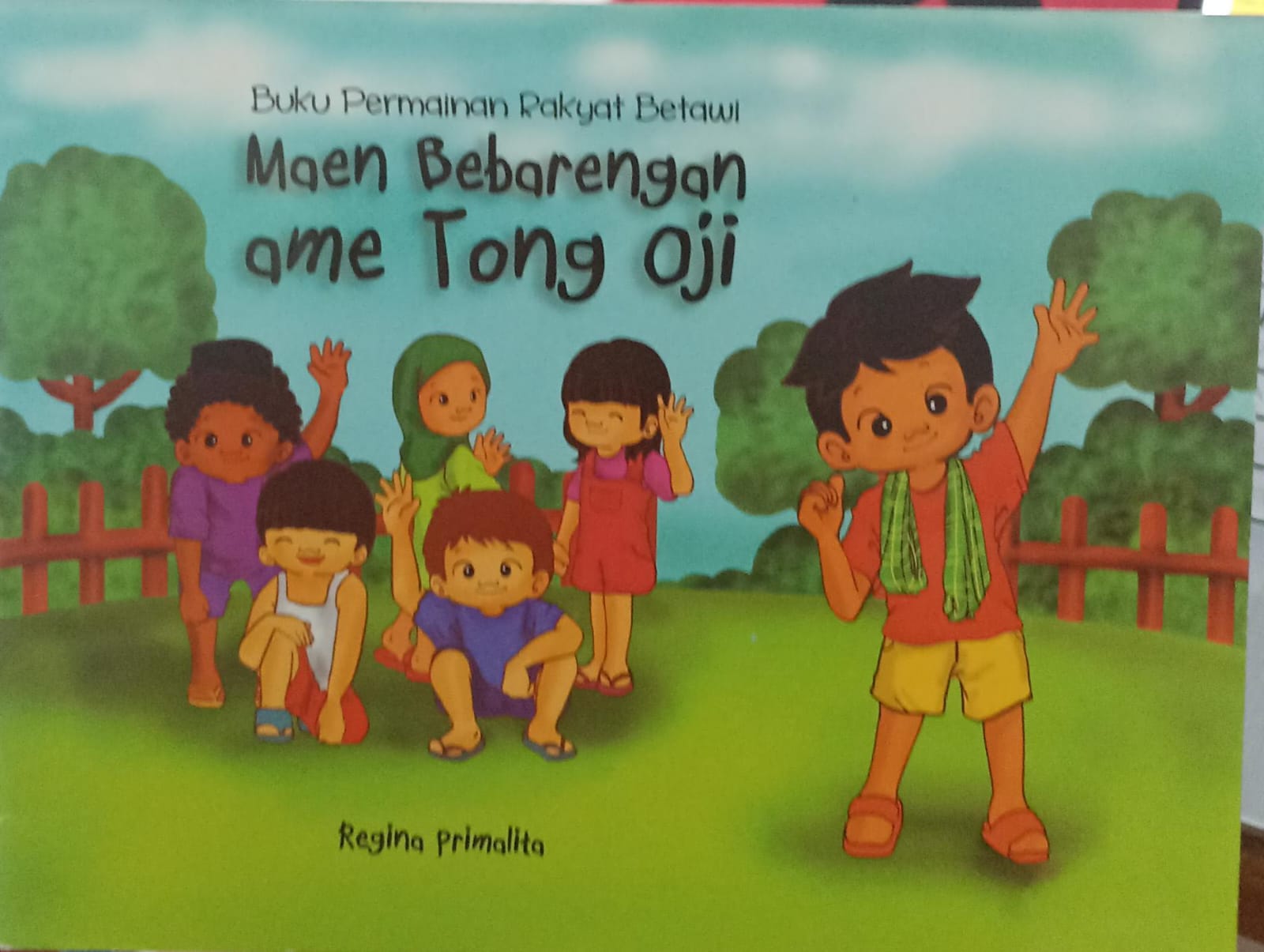 Maen bebarengan ame tong aji :  buku permainan rakyat betawi / Regina Primalita